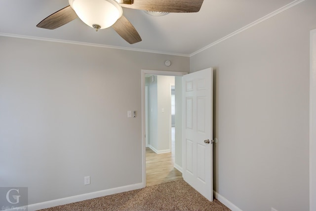 732 Camilla Dr, Shreveport, LA 71104 - empty room featuring light colored carpet, ornamental molding, baseboards, a ceiling fan, and a smoke detector