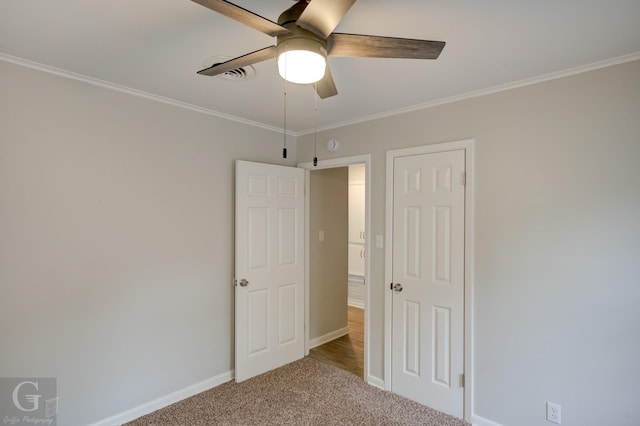 732 Camilla Dr, Shreveport, LA 71104 - unfurnished bedroom with carpet floors, baseboards, crown molding, and ceiling fan