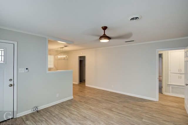732 Camilla Dr, Shreveport, LA 71104 - empty room with ornamental molding, a chandelier, light wood-style flooring, baseboards, and ceiling fan