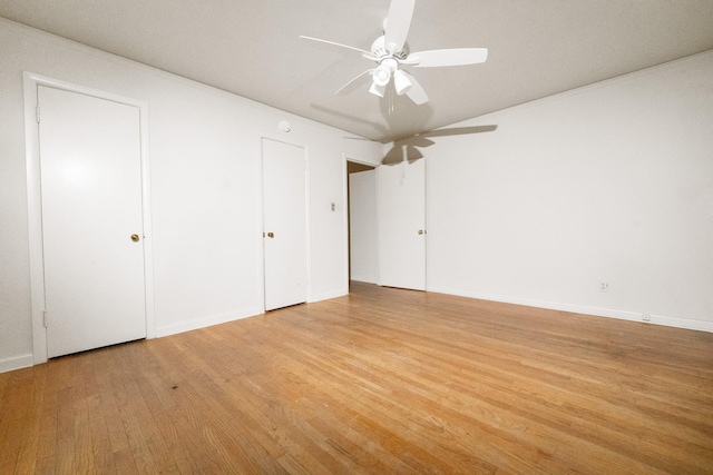 6908 Park Place Dr, Richland Hills, TX 76118 - unfurnished bedroom with light wood-style floors, ceiling fan, and baseboards