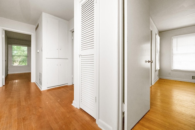 6908 Park Place Dr, Richland Hills, TX 76118 - hall featuring light wood-style floors and baseboards