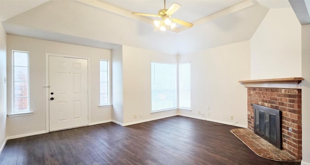 510 E Stone Cir, Wylie, TX 75098 - foyer entrance featuring dark wood finished floors, a fireplace, baseboards, and ceiling fan