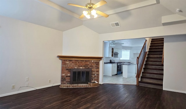 510 E Stone Cir, Wylie, TX 75098 - unfurnished living room featuring ceiling fan, vaulted ceiling, stairway, light wood-type flooring, and baseboards