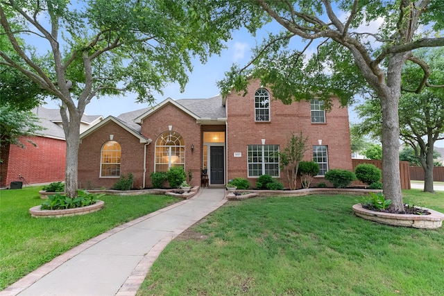 3601 Aqua Springs Dr, Plano, TX 75025 - traditional-style home with brick siding and roof with shingles