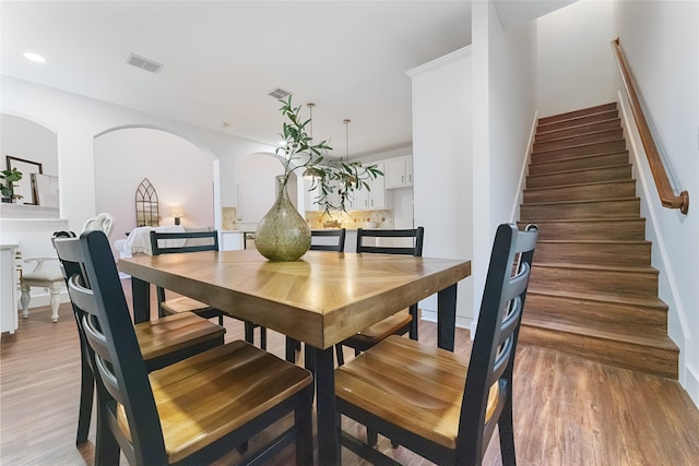 3601 Aqua Springs Dr, Plano, TX 75025 - dining room with stairway, light wood-type flooring, and recessed lighting