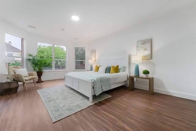 3601 Aqua Springs Dr, Plano, TX 75025 - bedroom with baseboards and wood finished floors