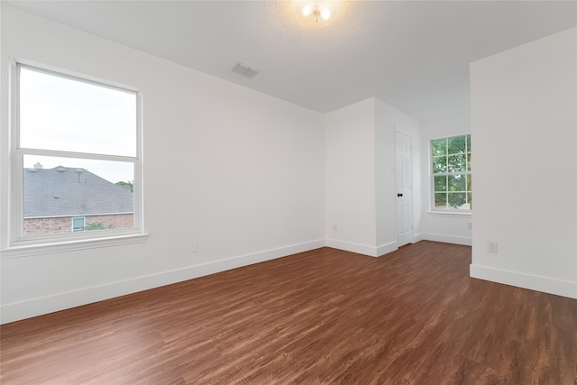 3601 Aqua Springs Dr, Plano, TX 75025 - unfurnished room with baseboards and wood finished floors