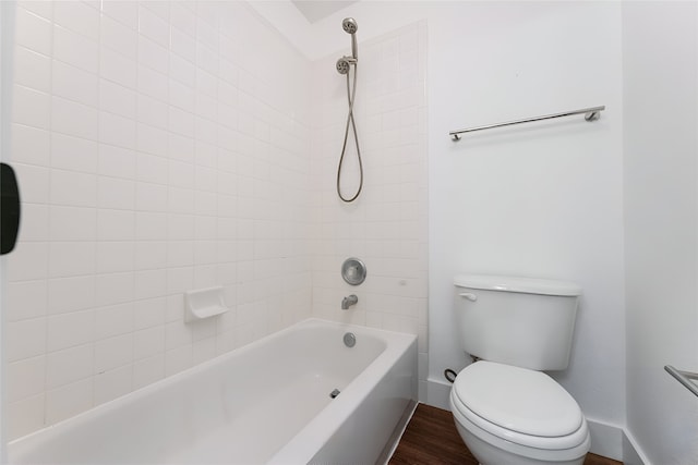 3601 Aqua Springs Dr, Plano, TX 75025 - full bathroom with shower / bathtub combination, baseboards, toilet, and wood finished floors