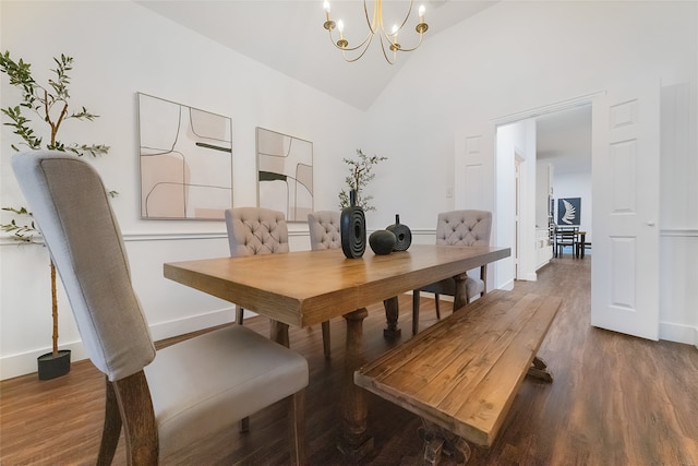 3601 Aqua Springs Dr, Plano, TX 75025 - dining space featuring a chandelier, wood finished floors, baseboards, and high vaulted ceiling