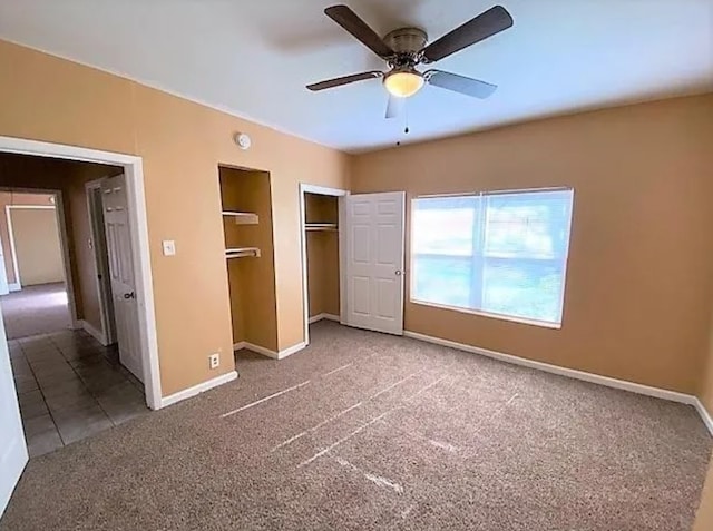 909 S Montgomery St, Sherman, TX 75090 - unfurnished bedroom featuring carpet, baseboards, and a ceiling fan