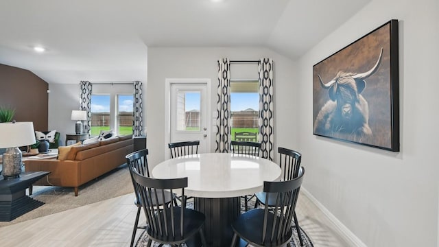 8417 Stout Dr, Fort Worth, TX 76131 - dining room featuring lofted ceiling, baseboards, and recessed lighting