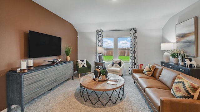 8417 Stout Dr, Fort Worth, TX 76131 - living area featuring vaulted ceiling, light colored carpet, and baseboards