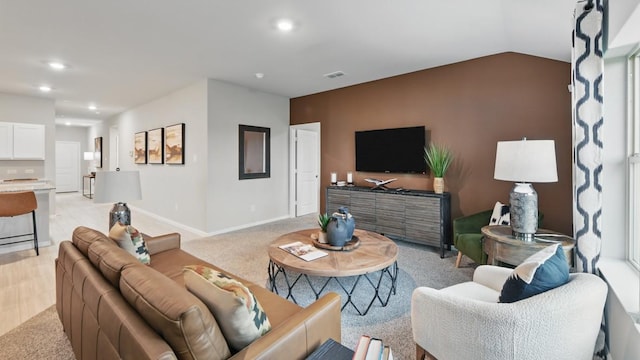 8417 Stout Dr, Fort Worth, TX 76131 - living room featuring recessed lighting, baseboards, light colored carpet, and lofted ceiling