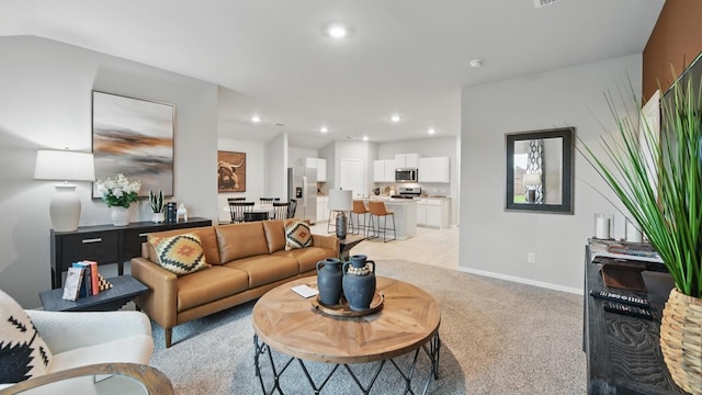 8417 Stout Dr, Fort Worth, TX 76131 - living area with light carpet, recessed lighting, and baseboards