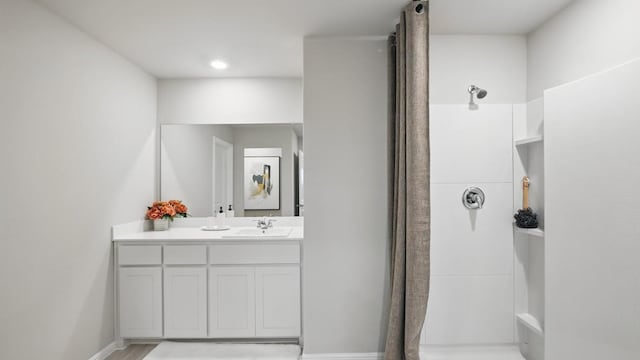 8417 Stout Dr, Fort Worth, TX 76131 - full bathroom with vanity, a shower, and baseboards