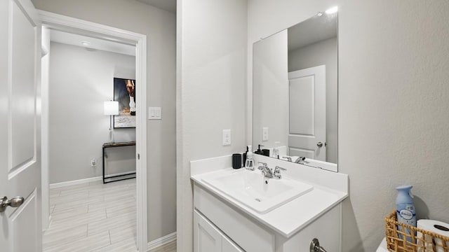 8417 Stout Dr, Fort Worth, TX 76131 - bathroom with vanity and baseboards