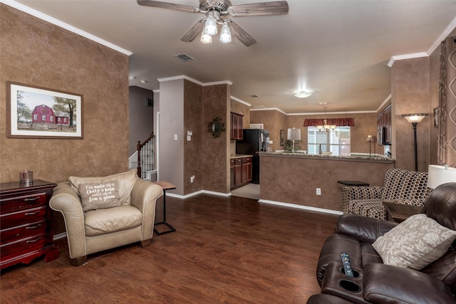 910 Glenbrook Dr, Grand Prairie, TX 75052 - living area with dark wood-style flooring, a chandelier, a ceiling fan, baseboards, and ornamental molding