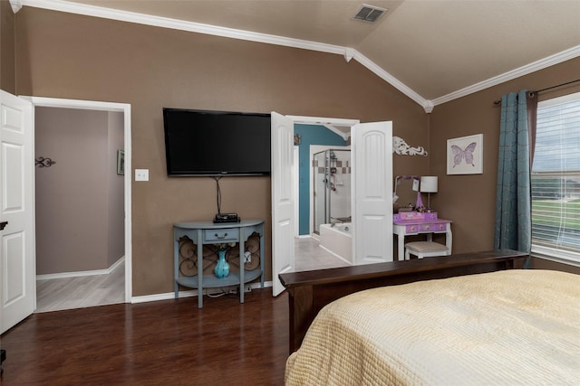 910 Glenbrook Dr, Grand Prairie, TX 75052 - bedroom featuring vaulted ceiling, wood finished floors, ornamental molding, and baseboards