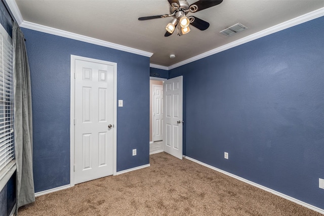 910 Glenbrook Dr, Grand Prairie, TX 75052 - unfurnished bedroom featuring crown molding, carpet, baseboards, and ceiling fan