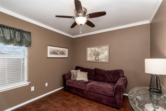 910 Glenbrook Dr, Grand Prairie, TX 75052 - living area featuring ornamental molding, wood finished floors, a ceiling fan, and baseboards