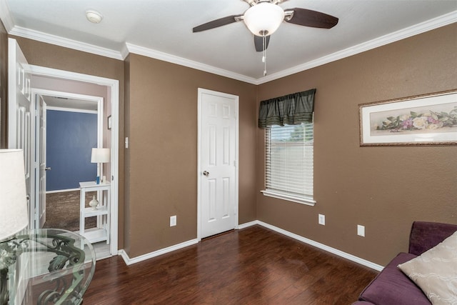 910 Glenbrook Dr, Grand Prairie, TX 75052 - sitting room with wood finished floors, crown molding, a ceiling fan, and baseboards