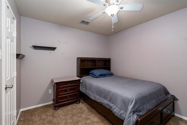 910 Glenbrook Dr, Grand Prairie, TX 75052 - carpeted bedroom with baseboards and ceiling fan