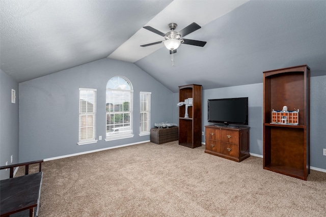 910 Glenbrook Dr, Grand Prairie, TX 75052 - unfurnished living room featuring carpet floors, ceiling fan, vaulted ceiling, and baseboards