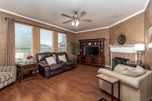 910 Glenbrook Dr, Grand Prairie, TX 75052 - living area with a ceiling fan, wood finished floors, crown molding, a fireplace, and a textured wall