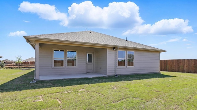 857 Cedarbrook, Fort Worth, TX 76131 - back of property featuring a patio area and roof with shingles