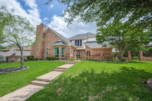 4113 Southwood E, Colleyville, TX 76034 - traditional home with a chimney, brick siding, and stucco siding