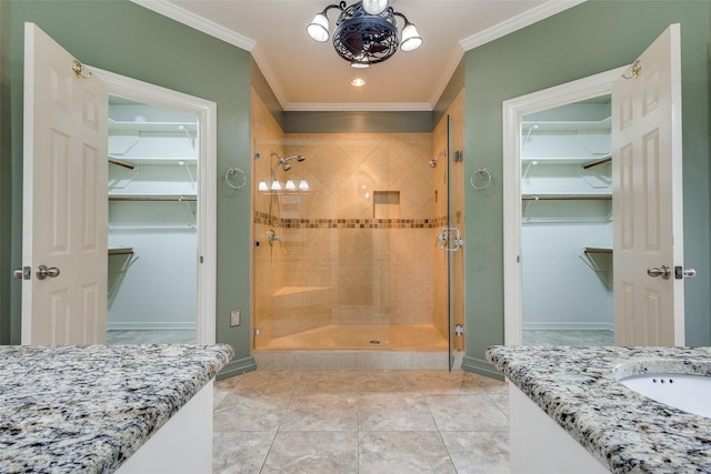 4113 Southwood E, Colleyville, TX 76034 - full bath with a walk in closet, crown molding, a stall shower, vanity, and baseboards