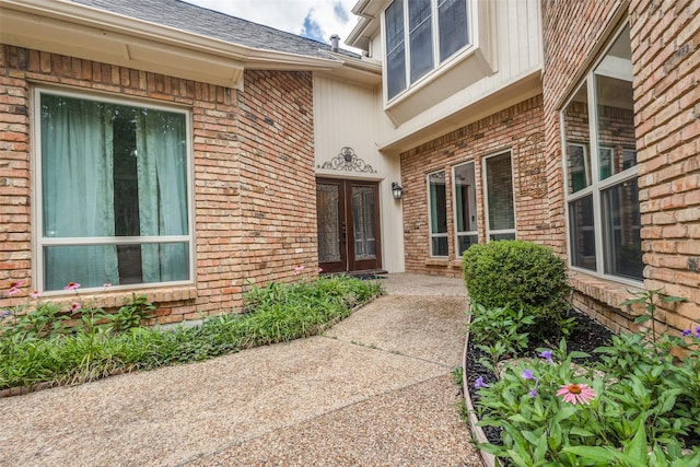 4113 Southwood E, Colleyville, TX 76034 - entrance to property with french doors and brick siding
