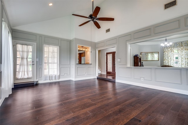 4113 Southwood E, Colleyville, TX 76034 - unfurnished living room featuring a decorative wall, a chandelier, a ceiling fan, high vaulted ceiling, and dark wood-style flooring