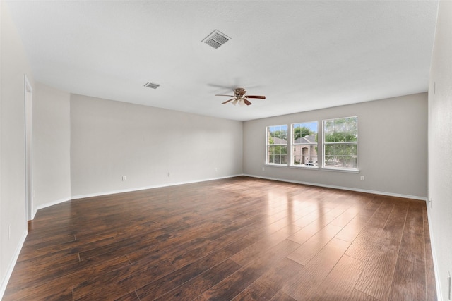 1817 Cedarbriar Dr, Mesquite, TX 75181 - spare room with a ceiling fan, wood finished floors, and baseboards
