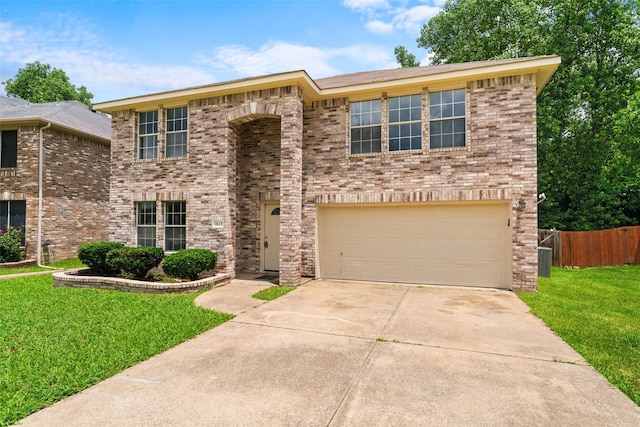 1817 Cedarbriar Dr, Mesquite, TX 75181 - traditional home featuring an attached garage, driveway, and brick siding