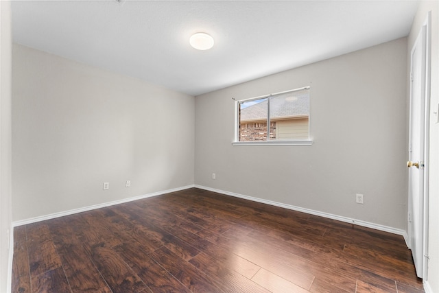 1817 Cedarbriar Dr, Mesquite, TX 75181 - spare room featuring wood finished floors and baseboards