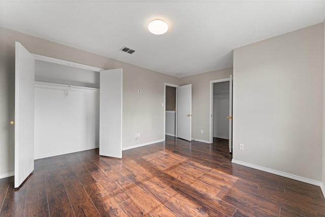 1817 Cedarbriar Dr, Mesquite, TX 75181 - unfurnished bedroom featuring wood finished floors, baseboards, and a closet