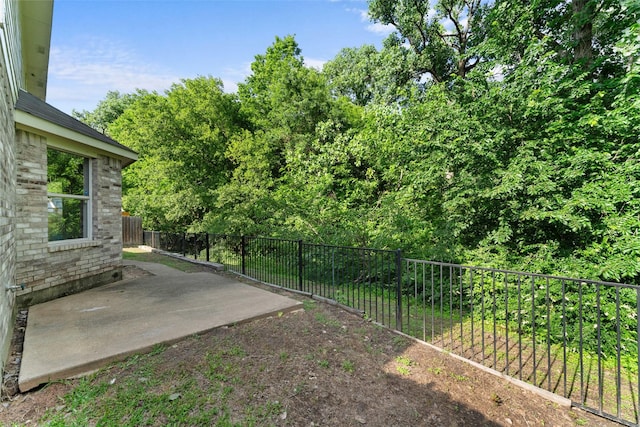 1817 Cedarbriar Dr, Mesquite, TX 75181 - fenced backyard with a patio area