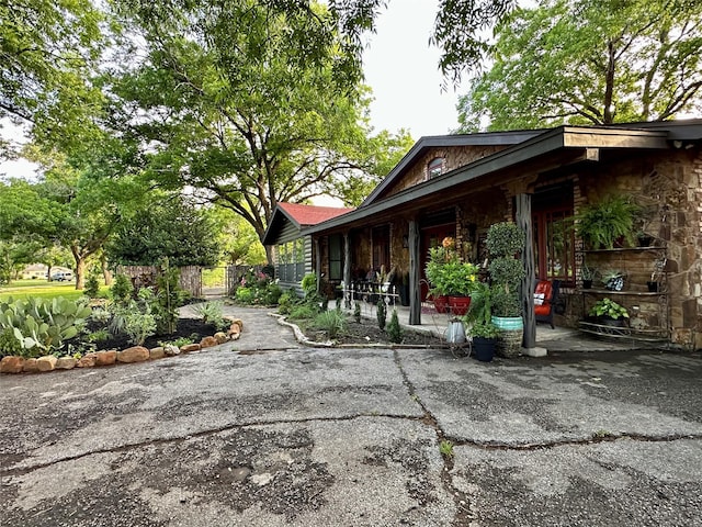 4000 Pecan Ln, Benbrook, TX 76116 - view of side of property with stone siding