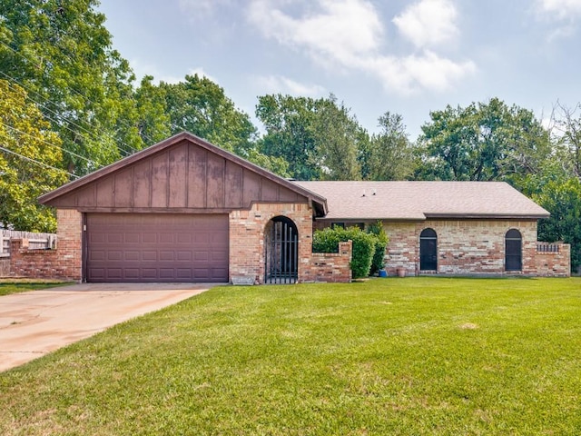 809 S Ridgeway Dr, Cleburne, TX 76033 - ranch-style house with brick siding, a garage, a front yard, and driveway