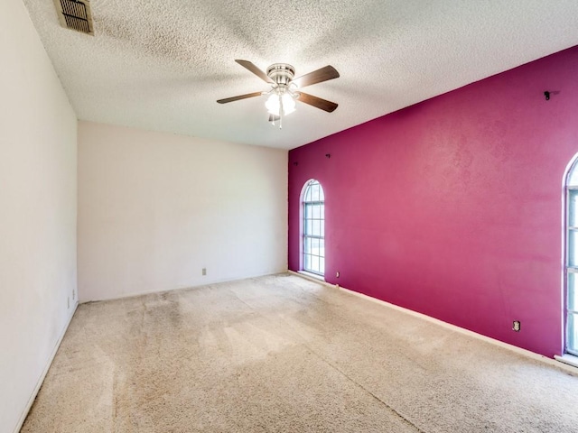 809 S Ridgeway Dr, Cleburne, TX 76033 - carpeted spare room with ceiling fan and a textured ceiling