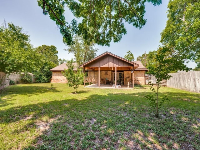 809 S Ridgeway Dr, Cleburne, TX 76033 - back of house with a patio and brick siding