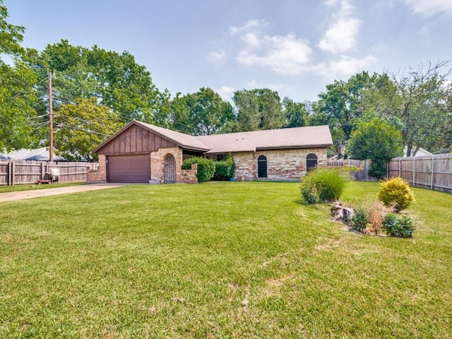 809 S Ridgeway Dr, Cleburne, TX 76033 - view of front facade featuring brick siding, an attached garage, driveway, and board and batten siding