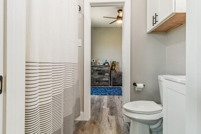 9759 Fm 638, Dawson, TX 76639 - bathroom featuring wood finished floors, toilet, and a ceiling fan