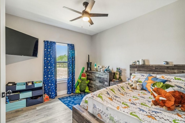 9759 Fm 638, Dawson, TX 76639 - bedroom featuring wood finished floors, ceiling fan, and baseboards