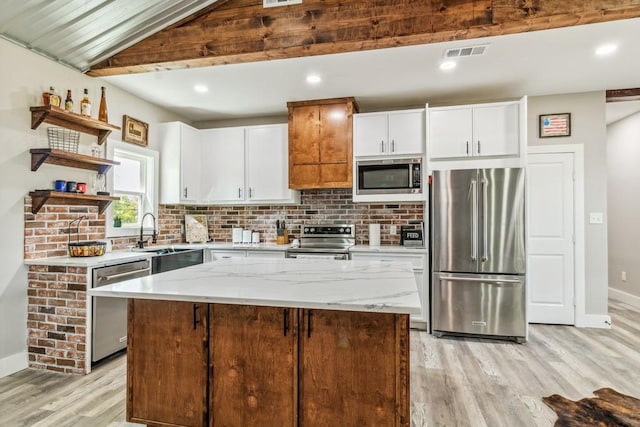 9759 Fm 638, Dawson, TX 76639 - kitchen with appliances with stainless steel finishes, a sink, light wood-style flooring, open shelves, and baseboards
