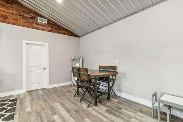 9759 Fm 638, Dawson, TX 76639 - dining room featuring lofted ceiling, wood finished floors, and baseboards