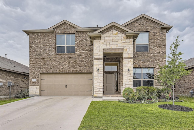 14613 Bootes Dr, Haslet, TX 76052 - view of front of home with a garage, brick siding, driveway, a front yard, and stone siding