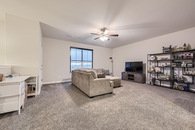 14613 Bootes Dr, Haslet, TX 76052 - living area featuring dark colored carpet, a ceiling fan, and baseboards