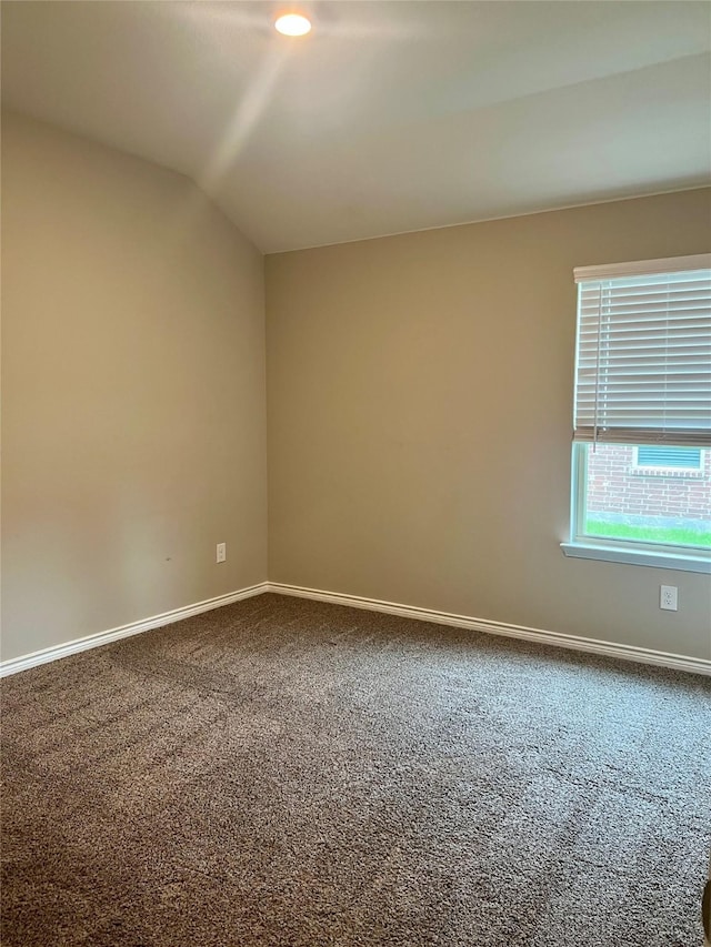 6413 Tudor Pl, Celina, TX 76227 - unfurnished room with dark colored carpet, baseboards, and lofted ceiling